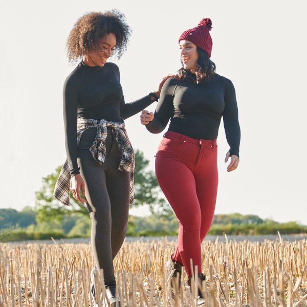 Square - Models Walking through fields - Skinny Outdoor Trouser , Base Layer and Accessories